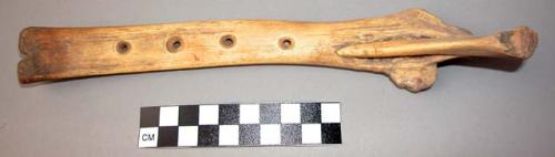 Bone flute with four holes