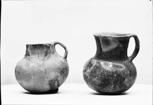 Two Gila redware Pitchers, Mended