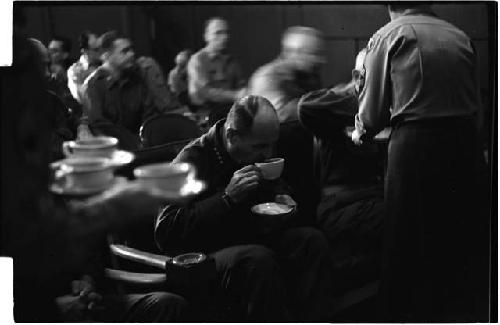 Man drinking from tea cup