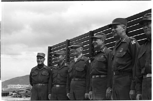 Military personnel standing in a line