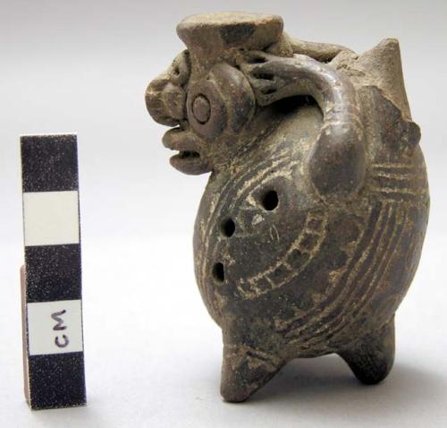 Ocarina with incised decoration; grotesque animal form