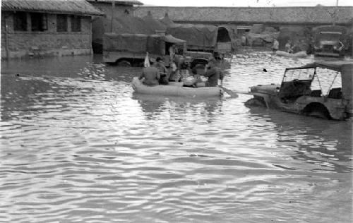 Men paddling a raft