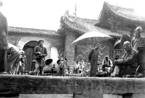 People in front of building