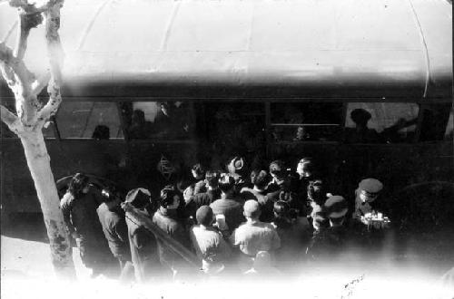 People boarding train