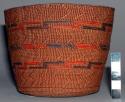 Tlingit closed twine basket. 3 bands of false embroidery in red and black.