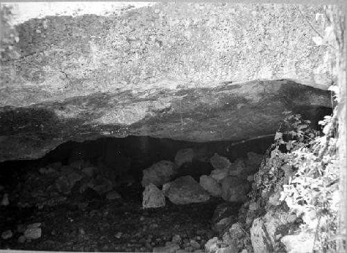 Entrance to cave; at lower right is seen remnant of door-jamb.