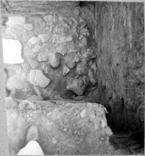 Last phase stone fill at floor level of sanctuary. Looking down to N.