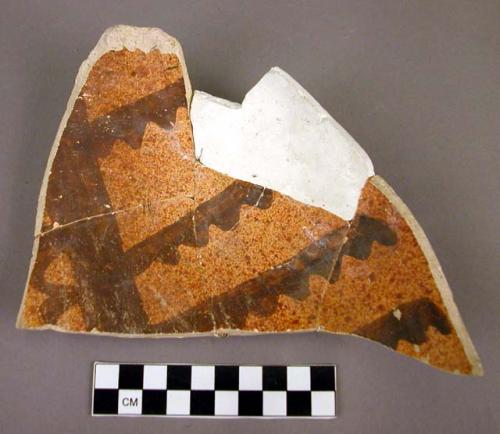 Restorable jeddito black on yellow potsherd