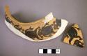 Sherds from pottery jar with anthropomorphic design