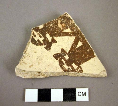 Jeddito black on yellow potsherd--zoomorphic