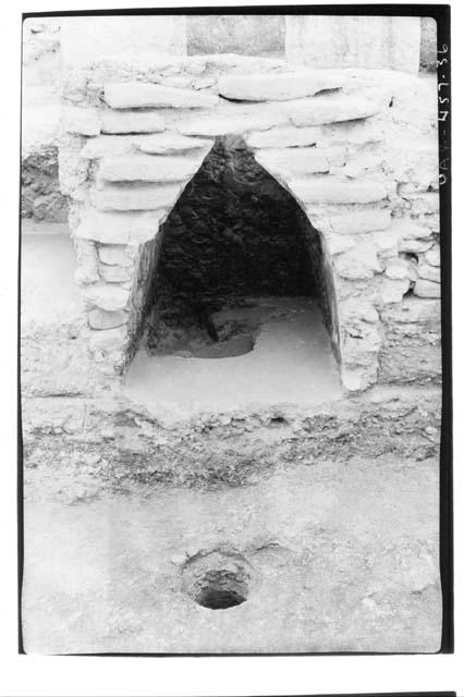 A-V: looking E. at section thru Burial 29. Notice chultun in foreground