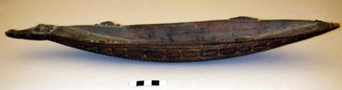 Carved, canoe-shaped dish