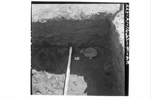 Broken metate and mano in debris in sect. N54.9E, 2.7' below surface at N53.8E a