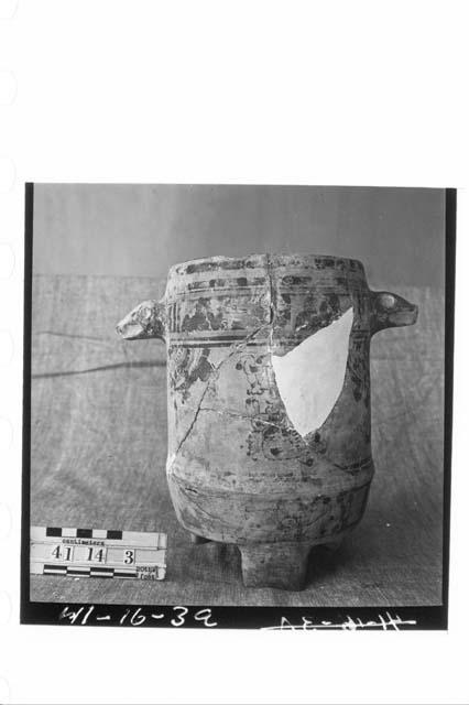 Tripodal Polychrome Pottery Jar with Two Animal-Head Lugs near Rim