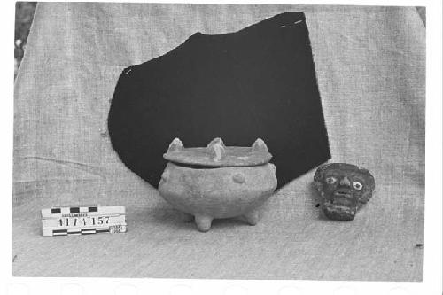 Tetrapodal pottery Bowl with Lid and Black-Slipped Figure Head