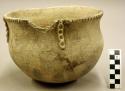 Ceramic vessel, incised design around flared rim