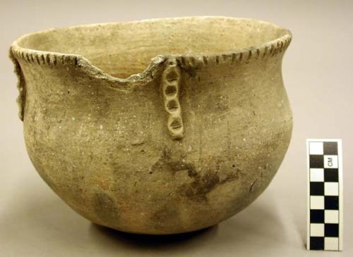 Ceramic vessel, incised design around flared rim