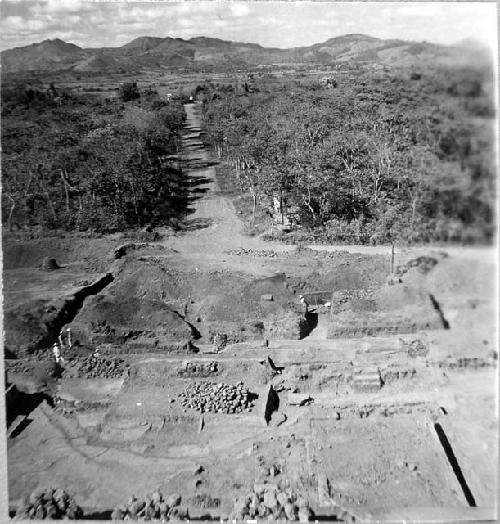 Looking N. from top of C. Str. showing excav. on N. side and new road to ruins