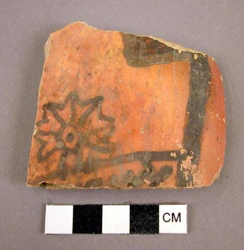 San bernardino black-on-yellow potsherd showing flower