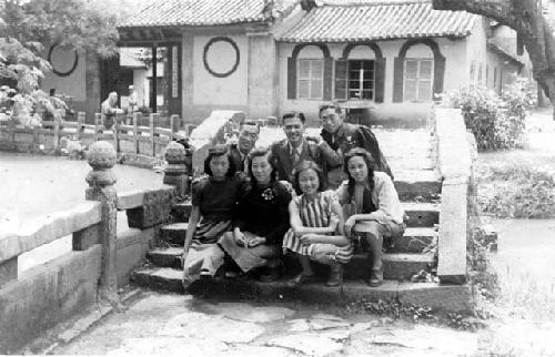 People posing on steps