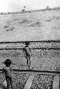 Children on railroad tracks