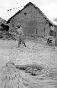 Woman in front of building