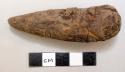 Conical wooden artifact: LENGTH: 7.9 cm. DIA. OF BASE: 2.2 cm.