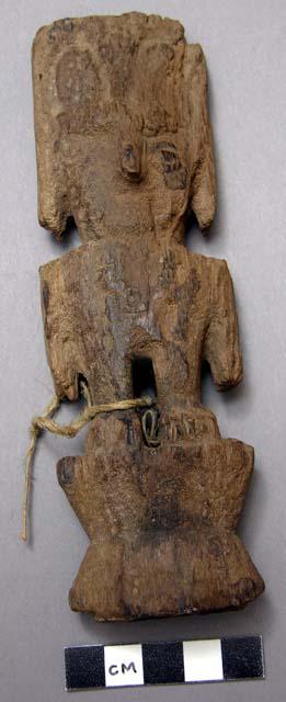 Carved wooden figure - human form; badly worn