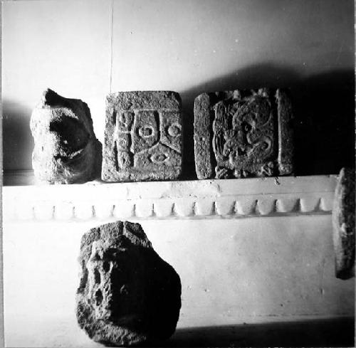Top (l to r): a.-Tenoned head from City of Campeche; b.-Glyph block from Xculoc.