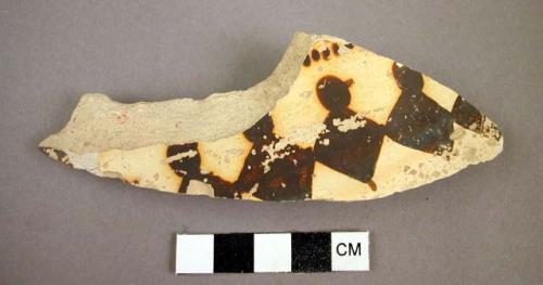 Zoomorphic potsherd--jeddito black-on-yellow