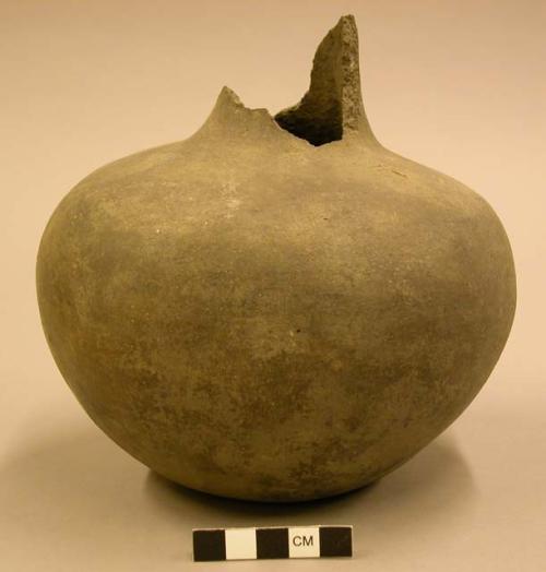 Ceramic complete vessel, broken at neck, plain