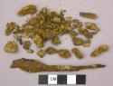 Iron knife tang; unidentified iron fragments