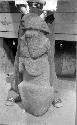 Two small stone sculptures. (412, 412a) front and side of stone sculpture.