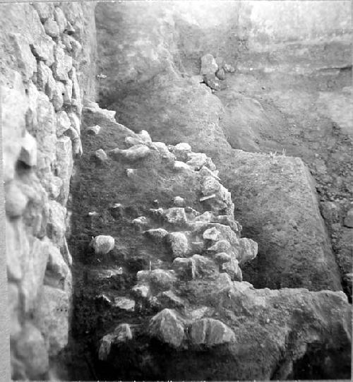 Stone wall fill, North balustrade and fallen stones, West side of C. Str.