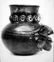 Large rattle jar representing human head.  Plumbate black to red ware
