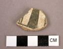 Pottery sherd; Red and black linear design:n