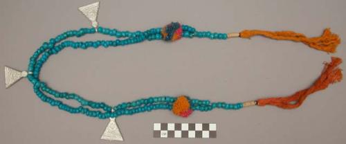 Camel, buffalo or oxen necklaces of blue beads (to keep off the evil eye; one wi