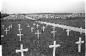 Cemetary with white crosses for gravemarkers