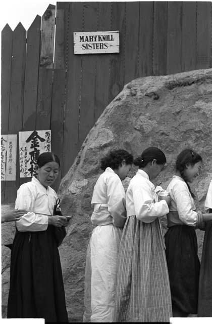 Women in a line