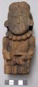 Carved wooden figure - human form with bead necklace; note headdress