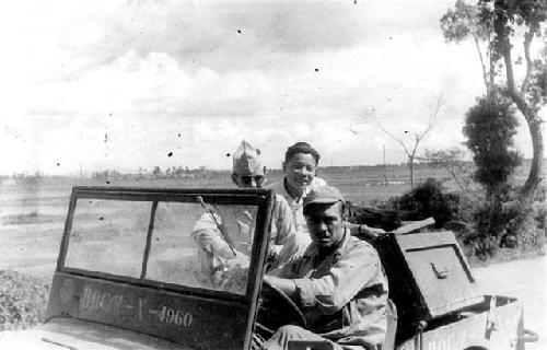 Men posing in truck