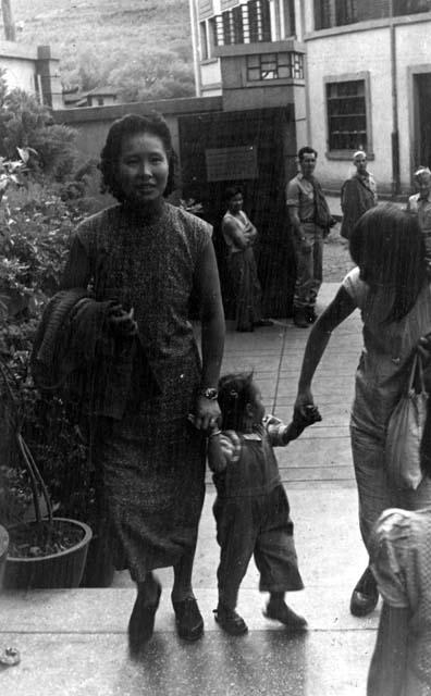 Woman walking with children