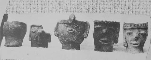 5 pottery incensarios, four with faces on their fronts