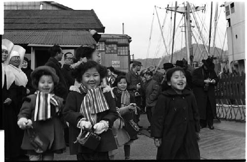 little children having fun, two nuns in background