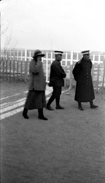 Janet Wulsin walking with two Chinese officials