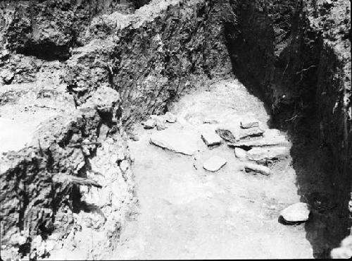 Pit House B, Manos, Metates, Slabs on Floor of South End, East Side