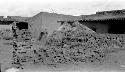 Brickyard with haystacks, buildings