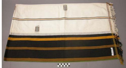 Textile; black and yellow striped.