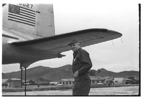 General Whitcomb near airplane