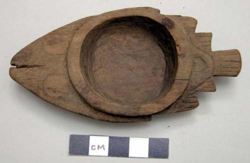 Small wooden bowl in shape of fish